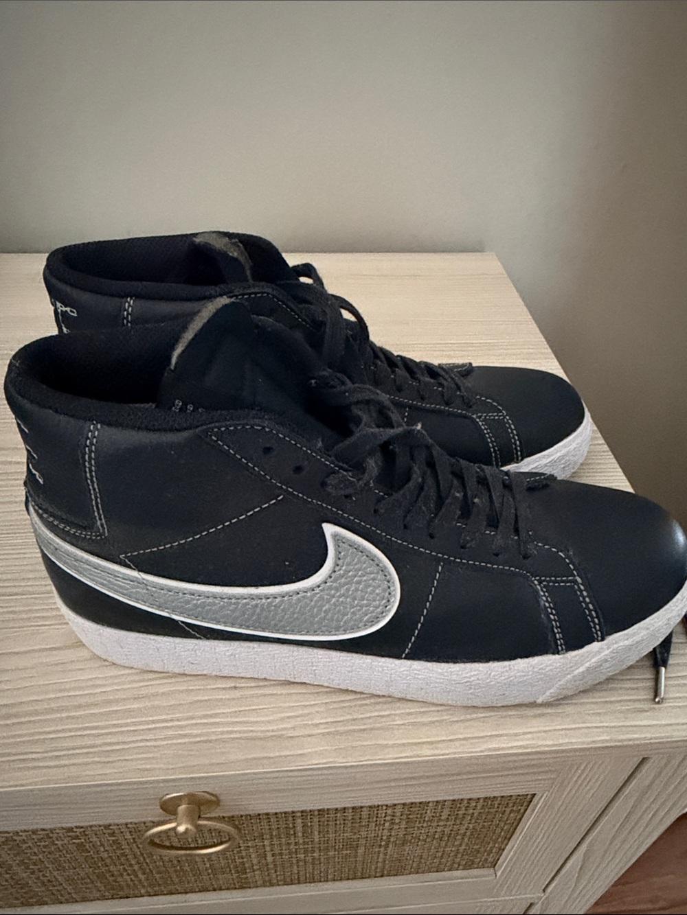 Nike Black Mid-Top Sneakers with White Swoosh